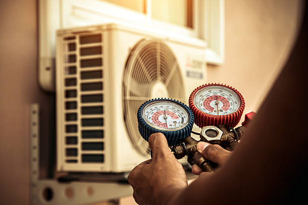 Professional Ac Installation technician working in Elmwood, MA